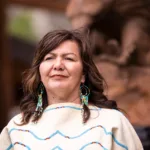 Rosanne Casimir, kúkpi7 (chief) of the Tk'emlúps te Secwépemc at a 2022 memorial marking the anniversary of the disco...