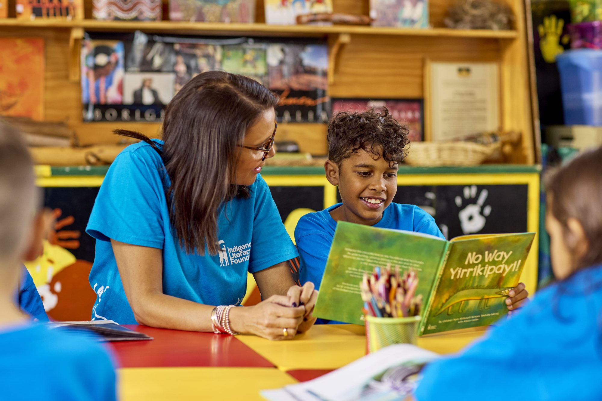 photo-indigenous-literacy-fund-child-reading-no-way-yirrikipayi-min.jpg.auspostimage.2000_0.medium